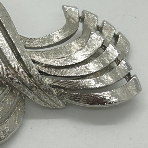 Vintage Monet Silver-Tone Brooch With Etched Textured Finish & Abstract Ribbon - Picture 6 of 13